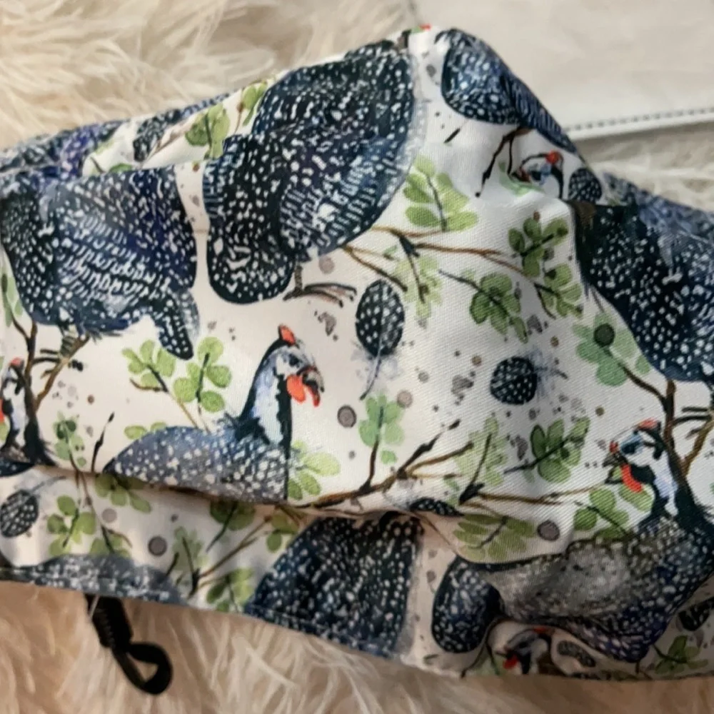 2/$10. New bird face mask